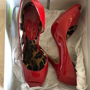 Jessic Simpson patent red peep toe heels.